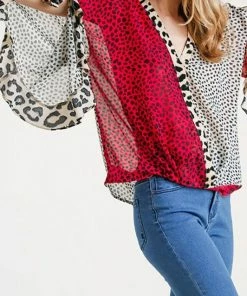 Umgee USA Sheer Multi-Animal Print Split Ruffled Sleeve Surplice Top Ladies