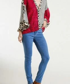 Umgee USA Sheer Multi-Animal Print Split Ruffled Sleeve Surplice Top Ladies