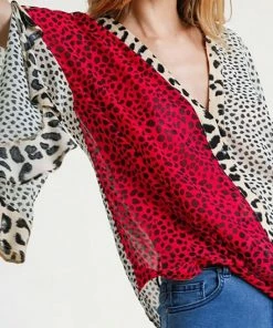 Umgee USA Sheer Multi-Animal Print Split Ruffled Sleeve Surplice Top Ladies