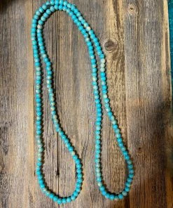 A Rare Bird Accessories Teakwood Bead Necklace