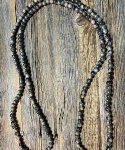 A Rare Bird Accessories Teakwood Bead Necklace