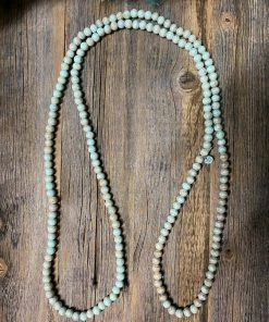 A Rare Bird Accessories Teakwood Bead Necklace